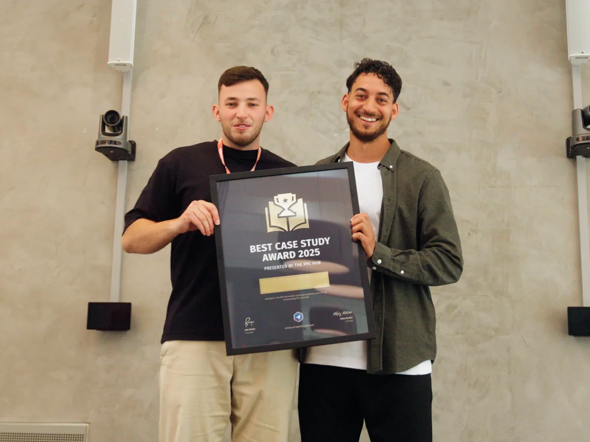 Taylor receiving the Best Case Study Award 2025 alongside a PPC Hub co-founder