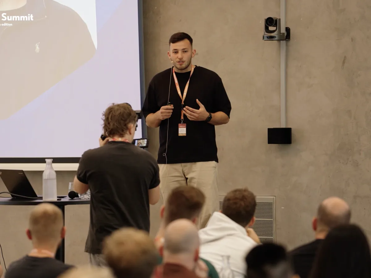 Taylor presenting on stage at PPC Hub Summit Copenhagen 2025